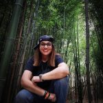Amanda in bamboo forest at Sky Top North Carolina with MS and Pride bracelets